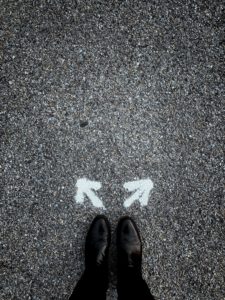 feet at a choice point crossroads